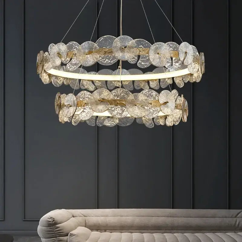 Modern gold glass flower led chandelier with double-tiered fan-shaped glass discs and warm lighting for living room