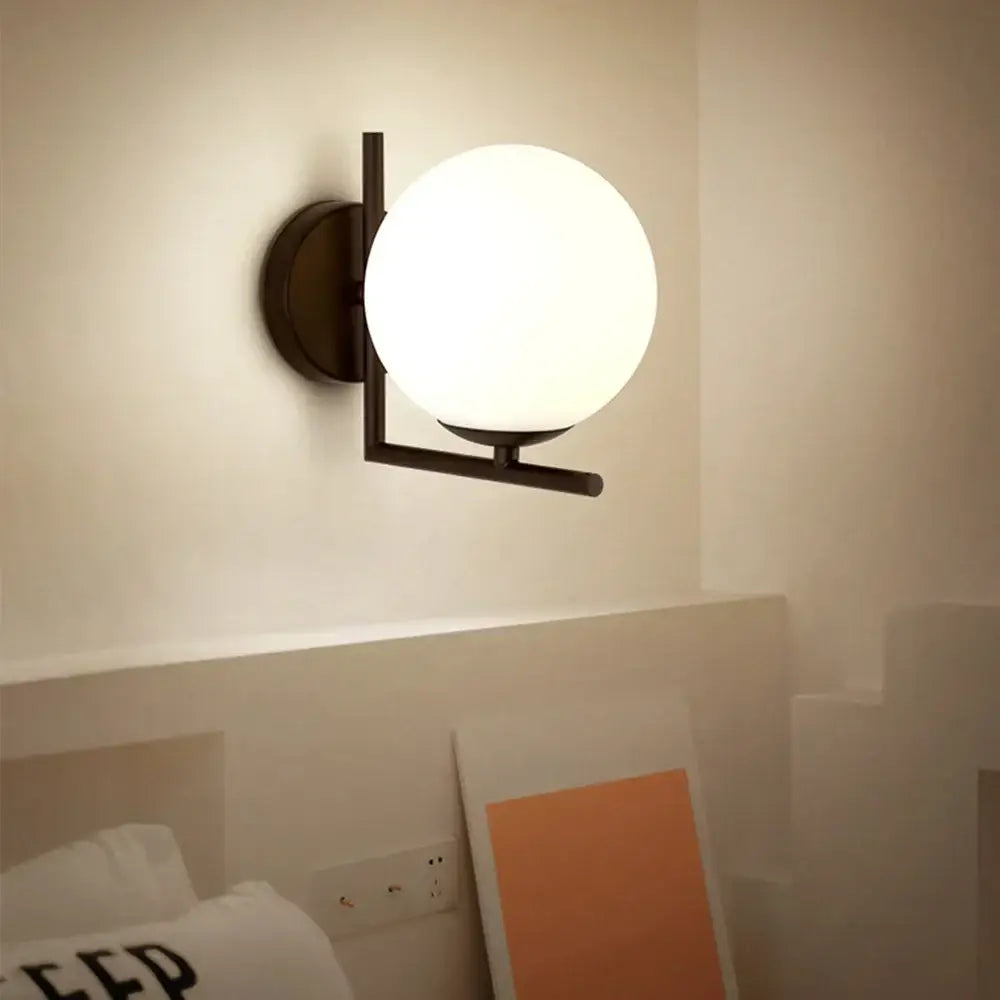 Modern black metal wall lamp with frosted white glass globe shade for decorbites glass globe wall bedroom lighting