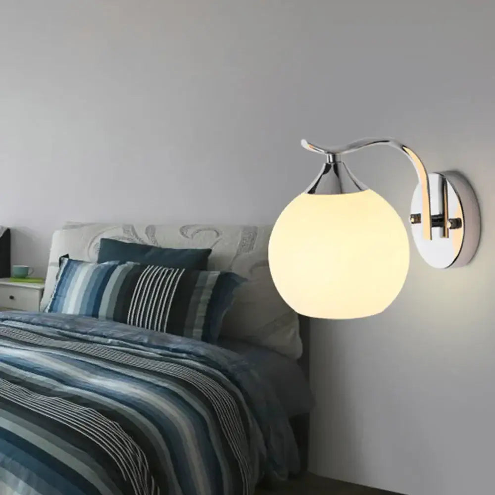 Modern chrome-finished wall lamp with frosted glass globe shade ideal for decorbites glass globe wall lighting