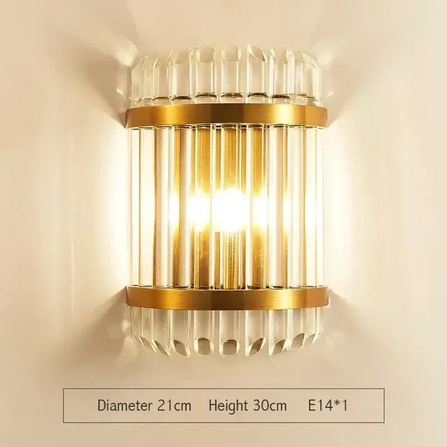 Modern gold wall sconce with glass rod crystal vertical rods and fluted glass accents for bedroom lighting