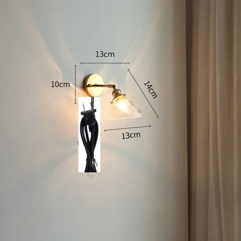 Modern gold wall light with brass finish, clear textured glass shade, adjustable arm, and bedroom pull chain led wall lamp