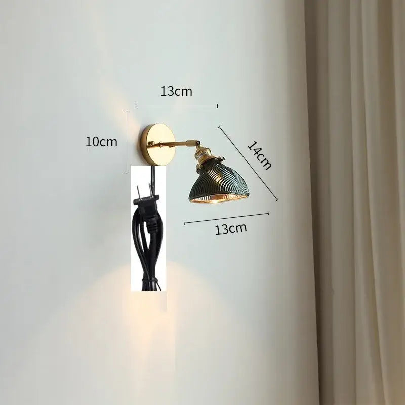 Vintage-style brass led wall light with dark green ribbed glass shade and bedroom pull chain for modern decor
