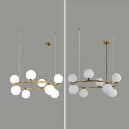 Modern gold pendant light chandelier with circular frame and frosted globe lights for adjustable dining room lighting