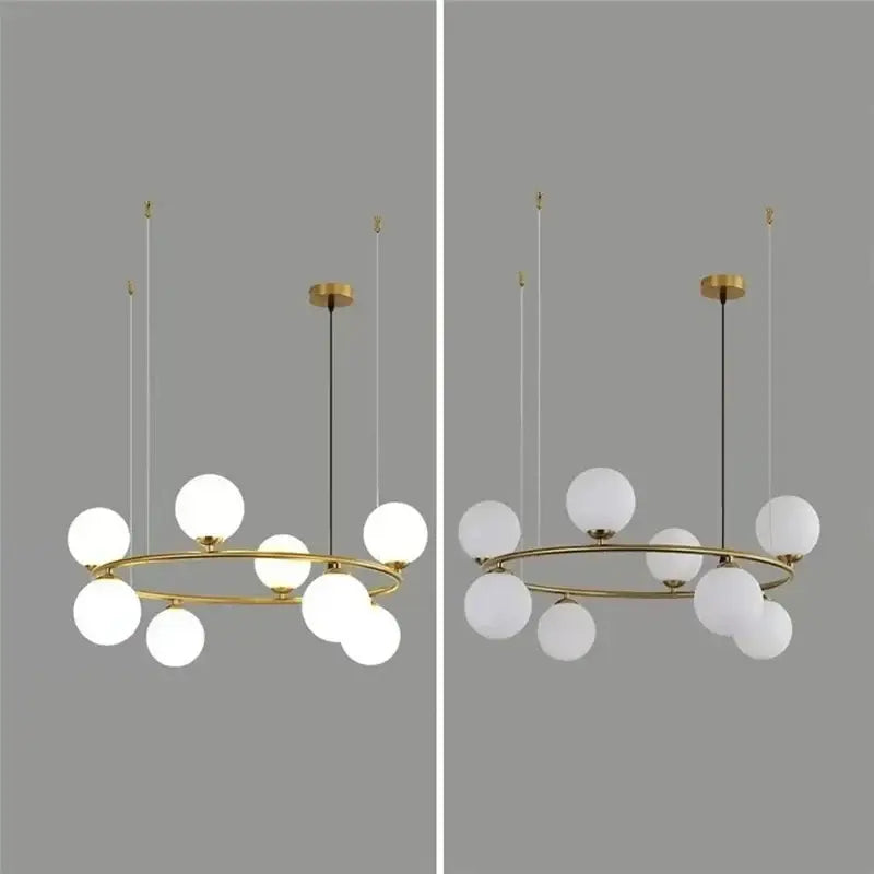Modern gold pendant light chandelier with circular frame and frosted globe lights for adjustable dining room lighting