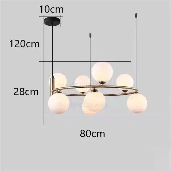 Modern gold brass-toned pendant light chandelier with eight frosted glass globes for adjustable dining room lighting