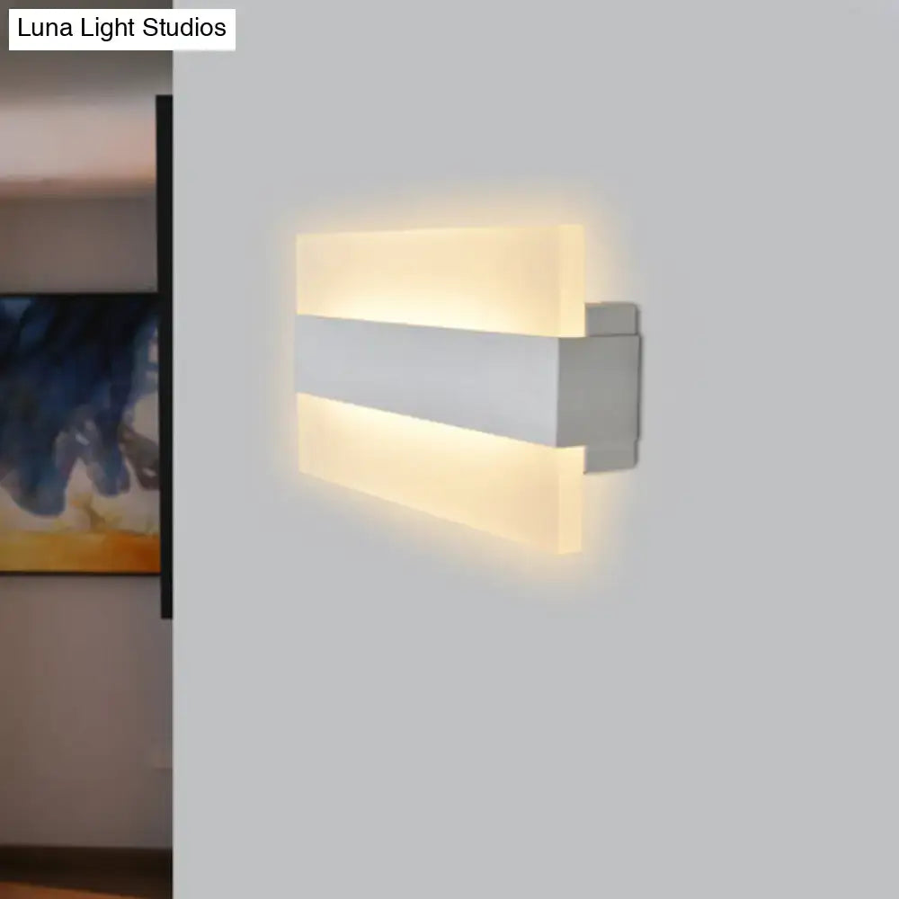 Modern gold and gray acrylic rectangular wall lamp with sleek white sconce light and warm diffused lighting for bedroom