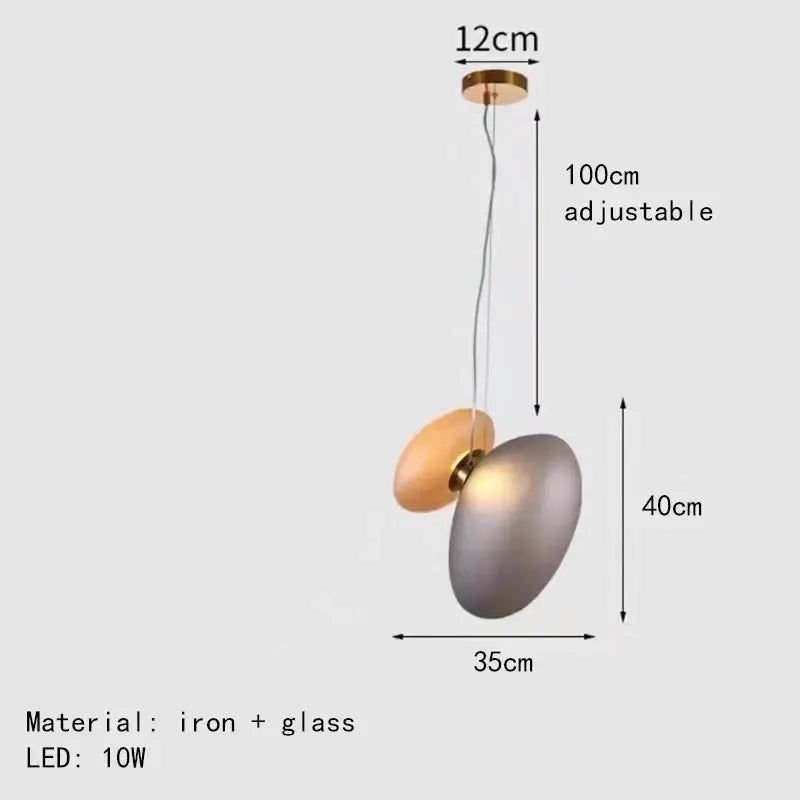 Modern gold and gray glass indoor pendant lights featuring overlapping oval shades suspended from an iron mount