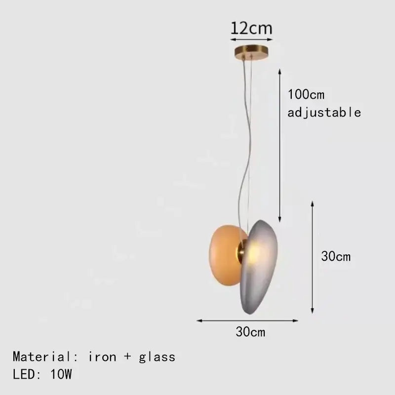 Modern gold and gray glass indoor pendant lights with asymmetrical amber and silver disc shades for dining room decorbites glass indoor