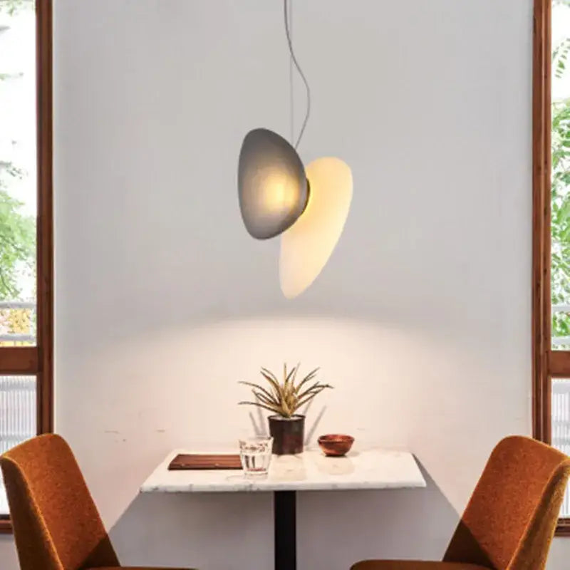 Modern gold and gray decorbites glass indoor pendant lights with two overlapping disc shades for dining room decor