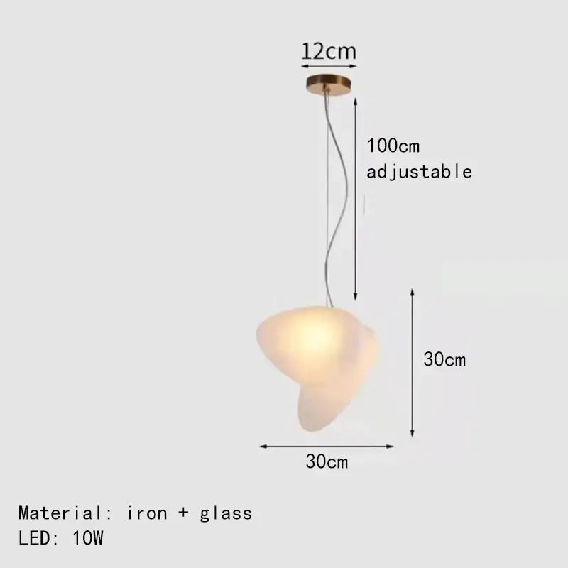 A modern gold and gray decorbites glass indoor pendant light with frosted glass shade and iron fixture for dining room