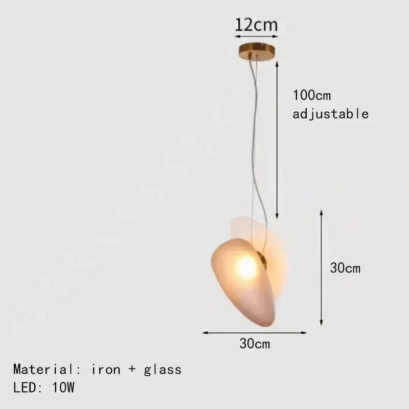A warm-toned modern gold and gray glass indoor pendant light with an iron fixture for dining room decorbites glass indoor