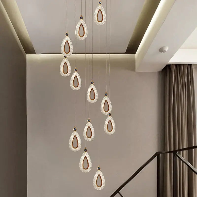 Modern gold heart led chandelier with teardrop crystal pendant light and warm ambient lighting by decorbites heart led