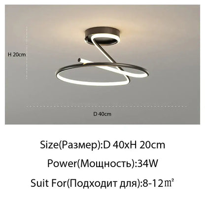 Modern gold heart line led chandelier with a sleek twisted ring design in brushed metallic finish for bedroom ceiling lighting