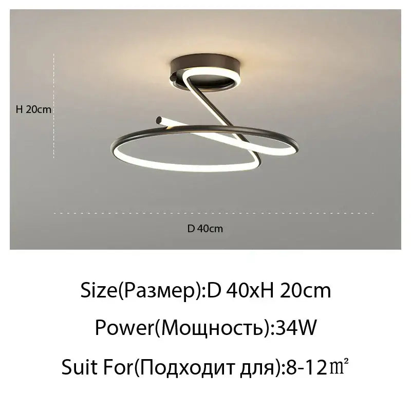 Modern gold heart line led chandelier with a sleek twisted ring design in brushed metallic finish for bedroom ceiling lighting
