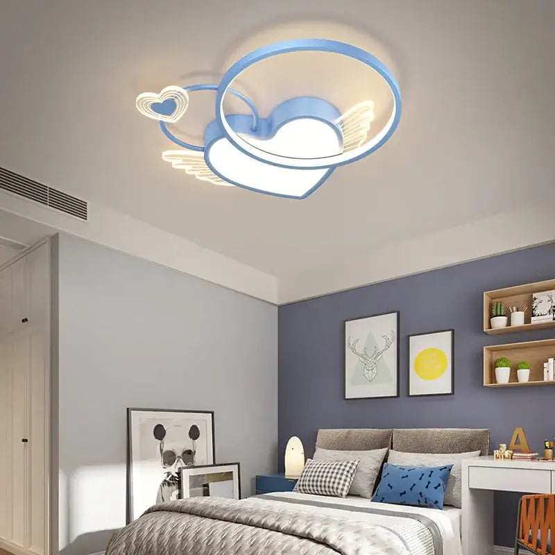 Modern gold heart shape led ceiling light in blue with wings and smaller hearts decorbites heart shape ceiling light