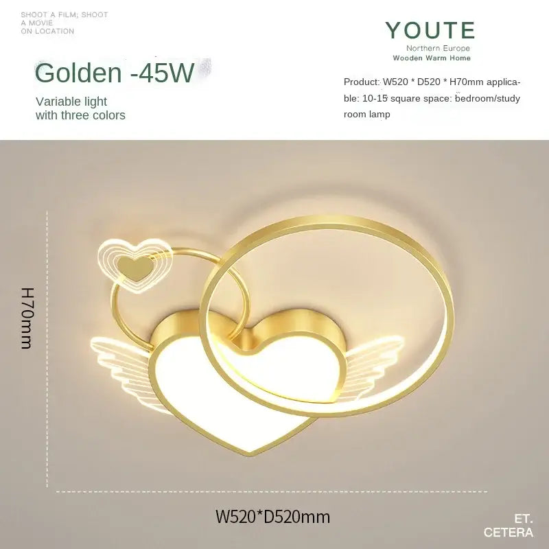 Modern gold heart shape ceiling light with wings and smaller heart accents in metallic gold finish decorbites heart shape