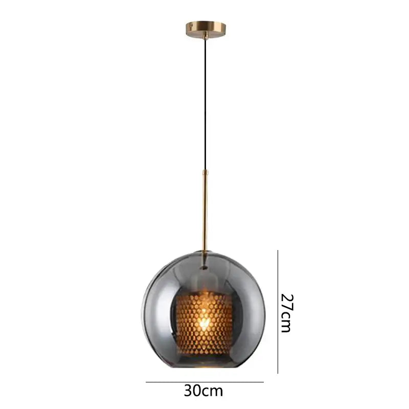 Modern gold honeycomb glass pendant light with smoked glass globe and brass rod for dining room fixtures