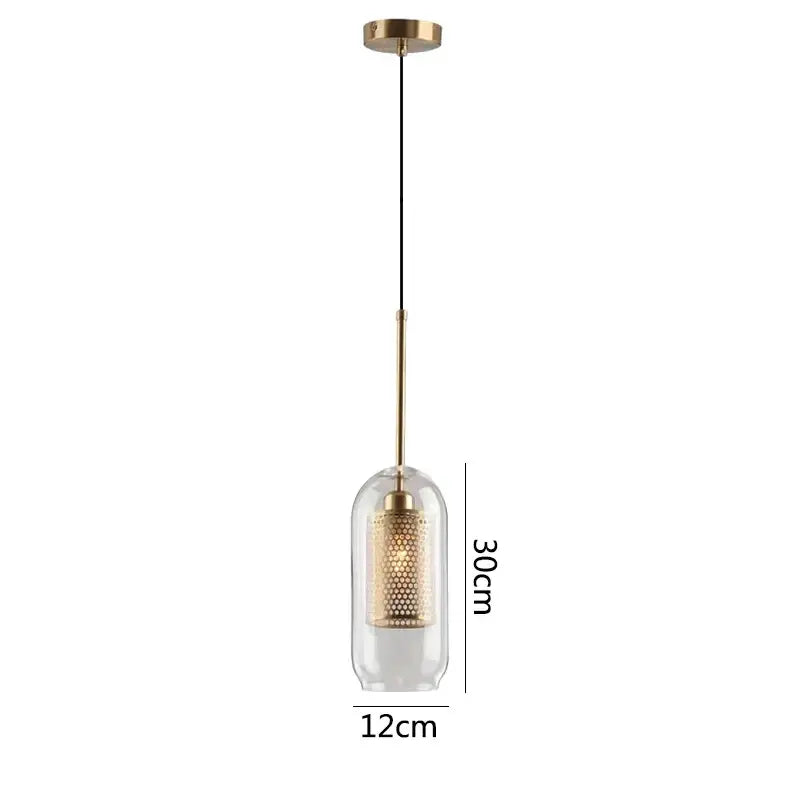 Modern gold honeycomb glass pendant lights featuring clear glass pendant enclosure with gold metal accents for dining room