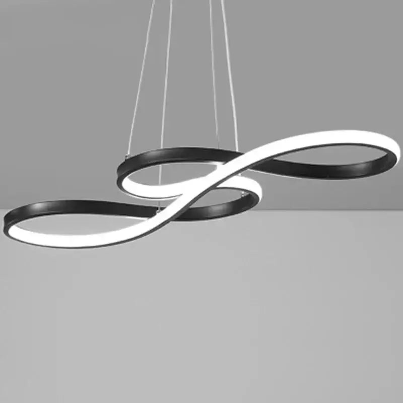Modern gold infinity cord pendant light with sleek black and white led rings for dining room with brushed nickel accents
