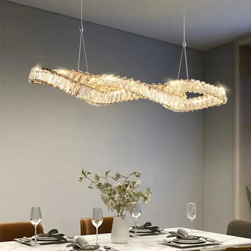 Modern gold infinity crystal led pendant chandelier with twisted design for dining room decorbites crystal led