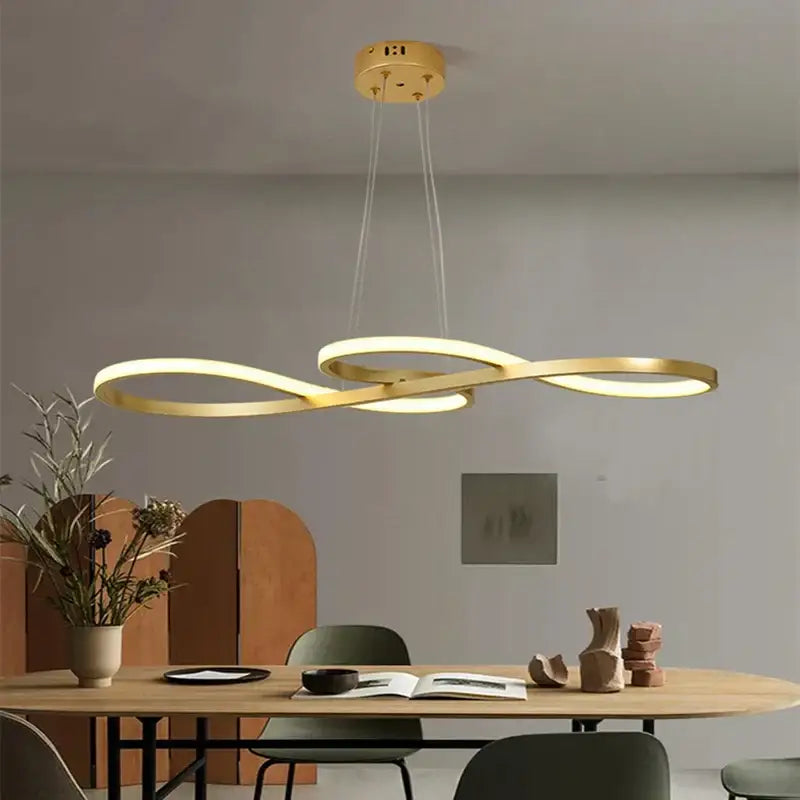 Modern gold infinity led elegant pendant lights with sleek design hanging above dining table for pendant lights decorbites elegant pendant