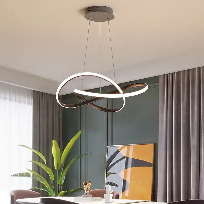 Modern gold infinity loop pendant light with sleek white and dark bronze metallic rings bulbs included for dining room