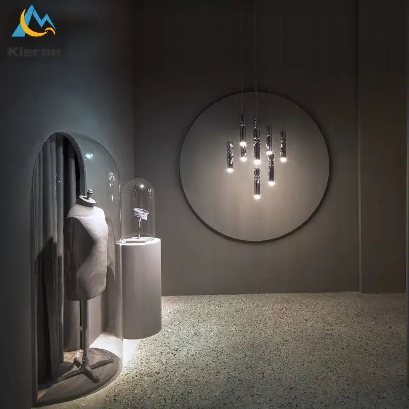 Modern gold iron art led pendant light with slender chrome cylindrical bulbs in a circular decorbites iron art design