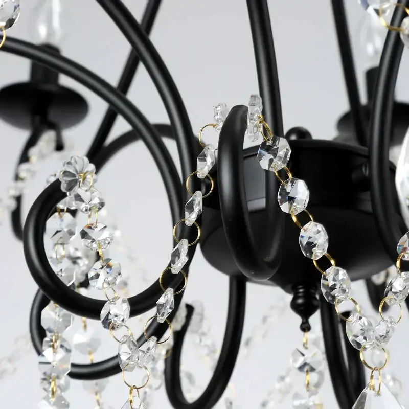 Modern gold iron crystal chandelier with black wrought iron, clear crystal beads, and gold-toned accents for luxury decorbites iron crystal lighting