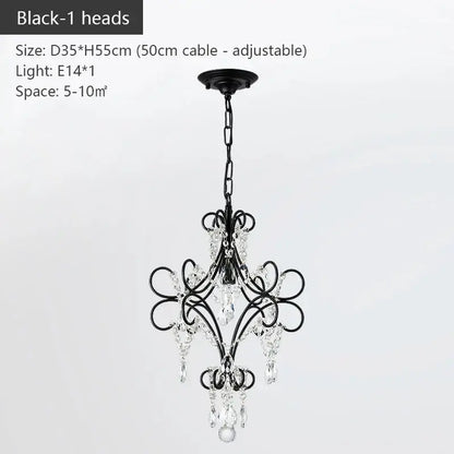 Black wrought iron crystal chandelier with ornate scrollwork for luxury dining room decorbites iron crystal lighting