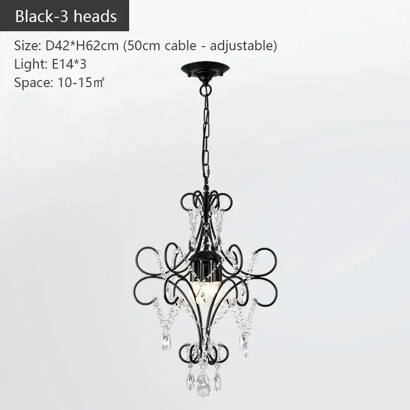Black wrought iron crystal chandelier with ornate scrollwork for luxury dining room decorbites iron crystal lighting