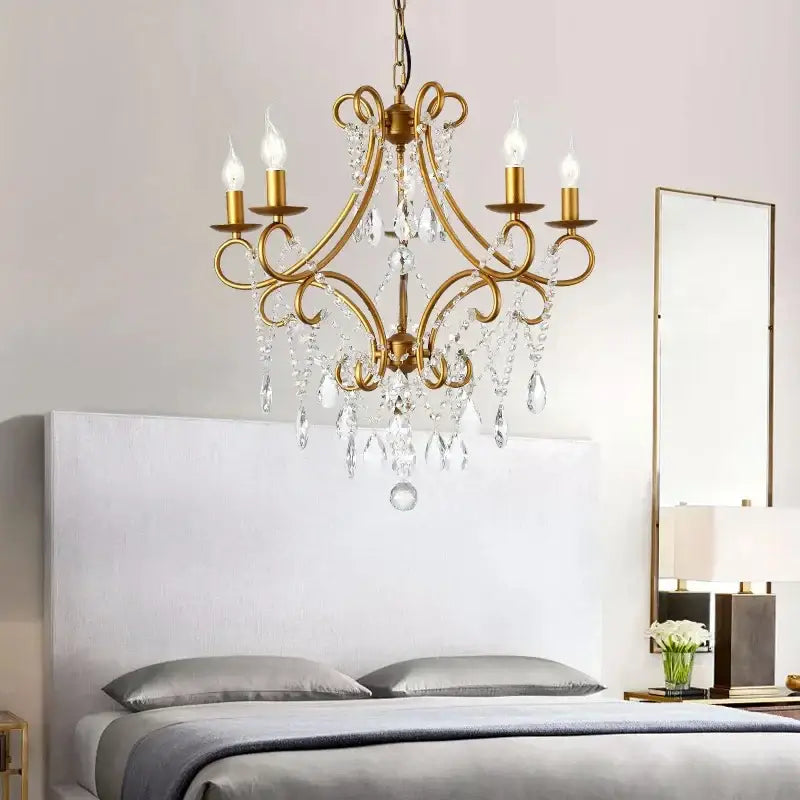Antique brass decorbites iron crystal chandelier with five candle-style bulbs and dangling crystal droplets for luxury lighting