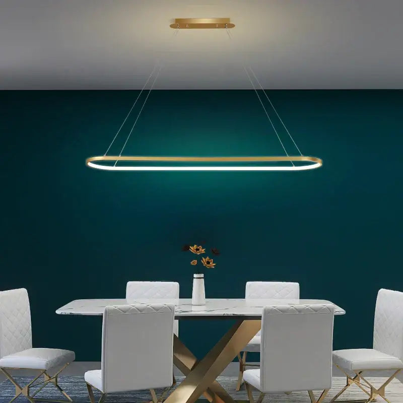 Modern gold iron dining chandelier ceiling lamp with oval pendant light and sleek minimalist design by decorbites iron dining