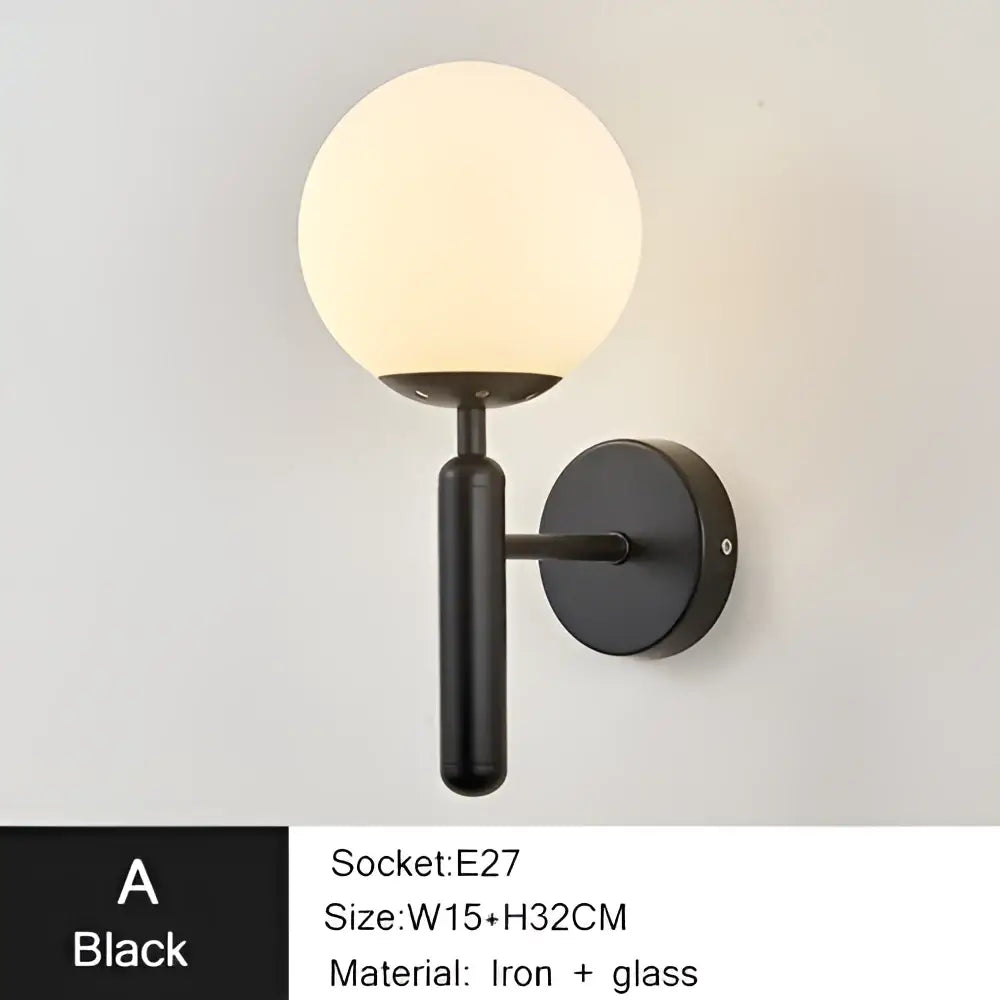 Modern gold iron led sconce lamp with textured black spherical glass globe and iron arm for bedroom decorbites iron led