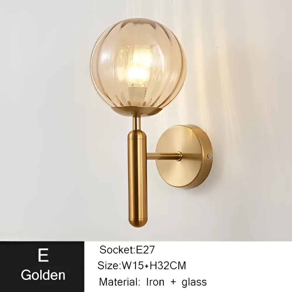 Modern gold iron led sconce lamp with textured spherical glass and brass-finished iron base for bedroom decorbites iron led