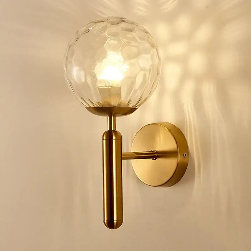 Modern gold iron led sconce lamp with honeycomb textured glass globe for bedroom by decorbites iron led