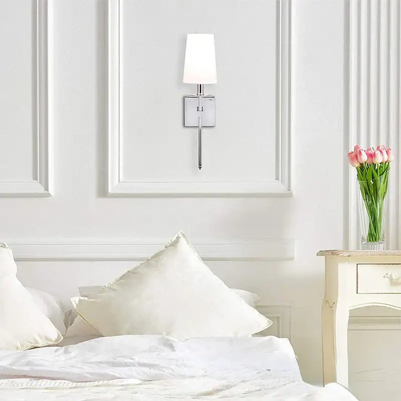 Modern gold iron led wall lamp with white cylindrical shade and polished chrome finish for bedroom decorbites iron led wall