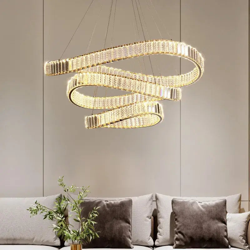 Modern gold irregular crystal led pendant chandelier with spiraled design and embedded crystal accents for foyer decorbites irregular steel style
