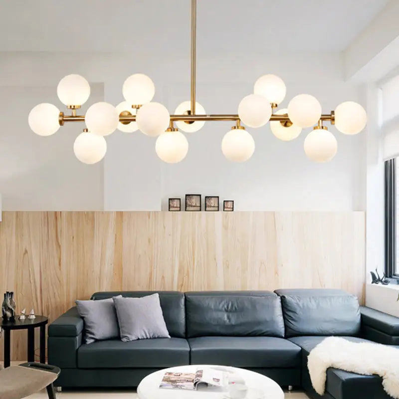 Modern gold island pendant light featuring multiple frosted glass globe bulbs for living room use 220v-240v 110v-120v
