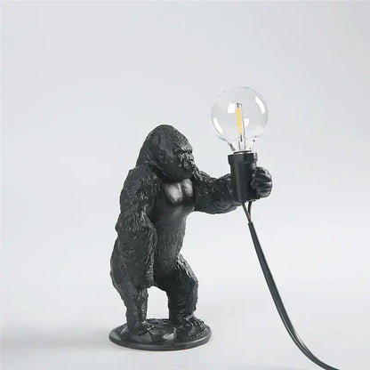 Black king kong resin night light table lamp holding a clear bulb for modern bedroom decorbites king kong decor