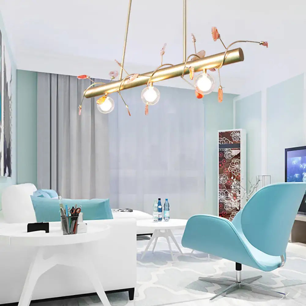 Gold-toned decorbites™ contemporary 3-light ceiling light with branching arms and clear glass globe bulbs 110v-120v light type
