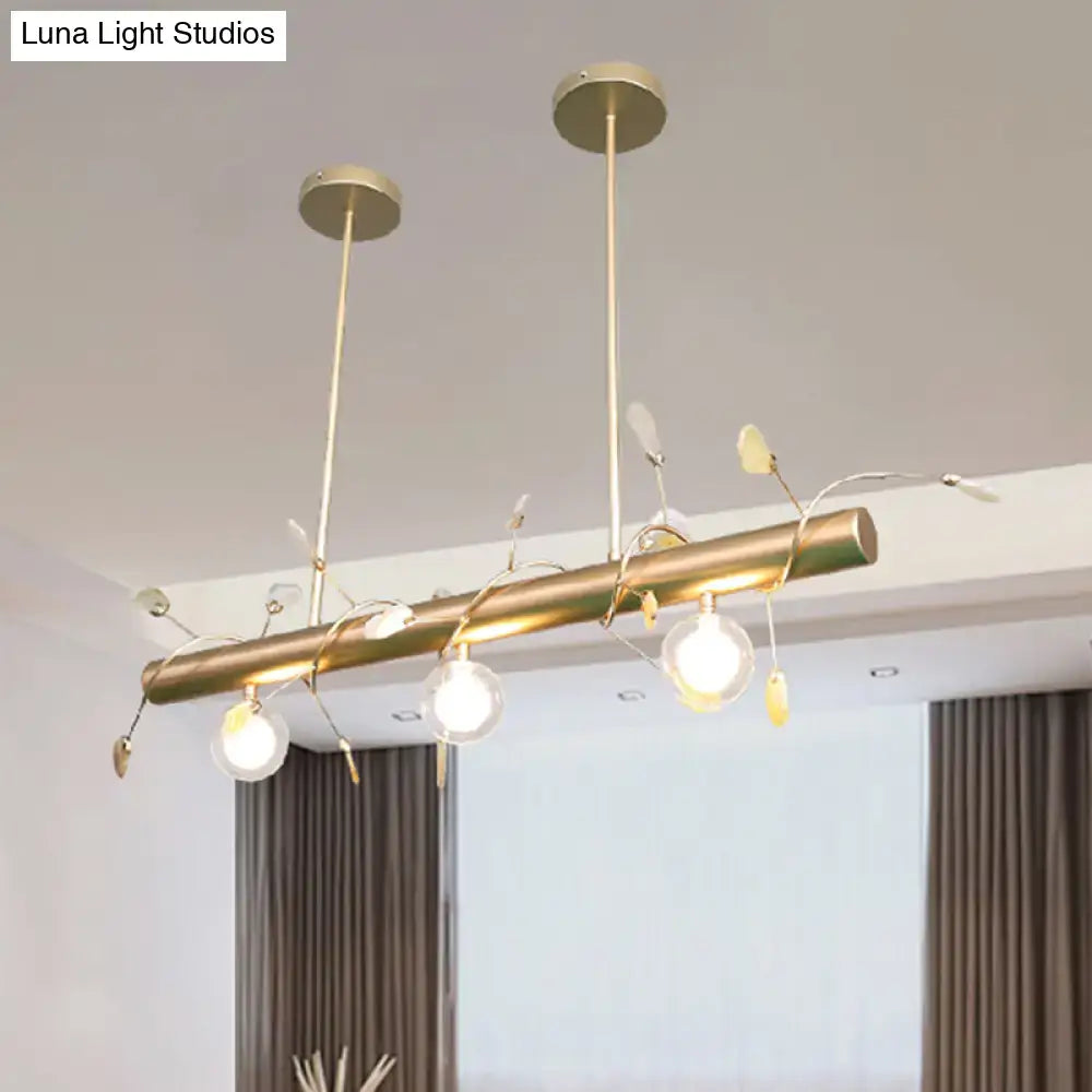 Decorbites™ contemporary 3-light ceiling pendant in gold with clear glass globes and leaf accents compatible with 110v-120v and 220v-240v