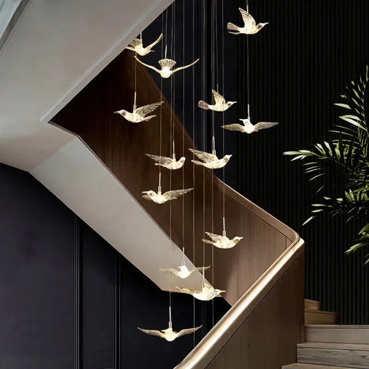 Modern gold led bird pendant light with metallic finish and warm glow for dining room decorbites led bird lighting
