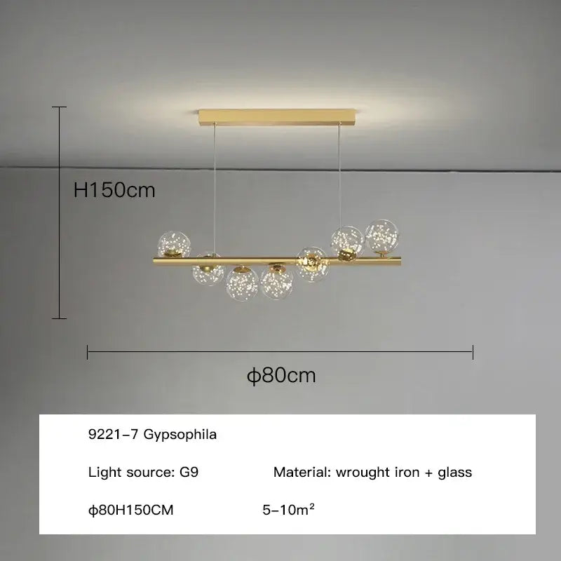 Modern gold led ceiling chandelier with horizontal wrought iron bar and clear glass globe shades for dining room lighting