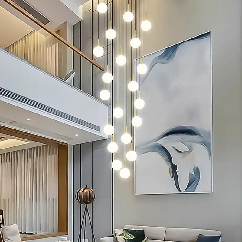 Modern gold led ceiling lamp chandelier featuring spherical white glass bulbs suspended by slender rods for dining room decorbites led ceiling
