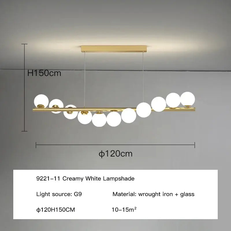 Modern gold led long chandelier with a sleek wrought iron frame and creamy white glass ball shades for dining room decorbites glass ball ball g9 led