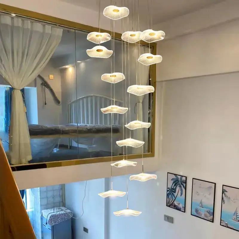 Modern gold led lotus chandelier with cloud-shaped white lampshades by decorbites for staircase and dining room decor