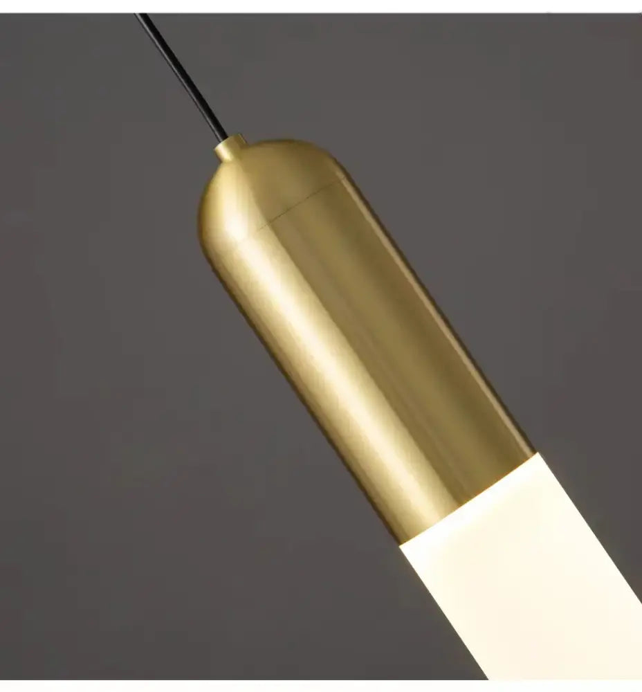 A sleek modern pendant lamp with a brushed brass top and frosted glass diffuser by decorbites gold led for bedroom and kitchen lighting