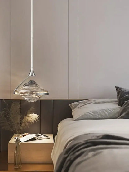 Modern gold led pendant lamp with a sleek silver stem and clear textured glass shade for dining room decorbites gold led