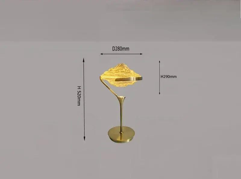 Modern gold led pendant lamp with textured glass and gold mountain-shaped table lamp featuring sleek curved stand decorbites gold led