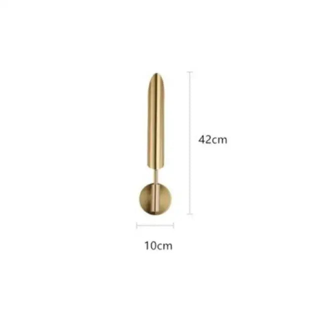 A sleek brass wall lamp 42cm tall with cylindrical stem and circular base modern gold led single head decorbites gold led